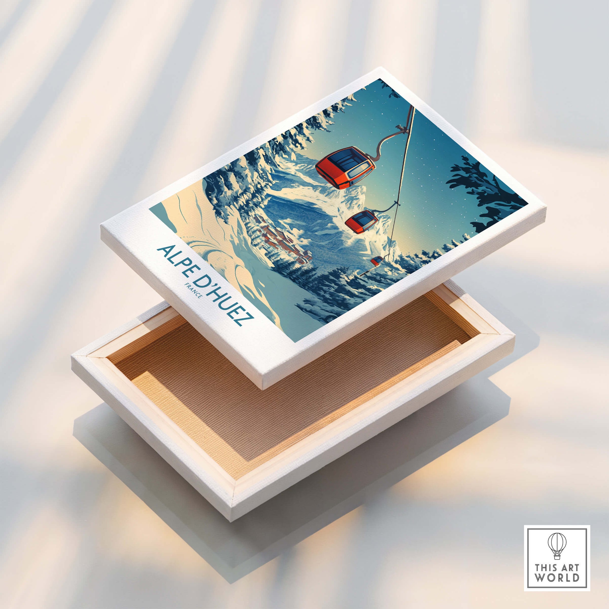 Alpe d'Huez Poster France displayed on a white box, showcasing stunning mountain scenery and vibrant colors.