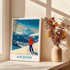Alpe d'Huez Wall Art Ski Poster featuring a skier in the French Alps with vibrant colors and stunning mountain scenery.