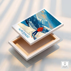 Alpe d'Huez Wall Art Ski Poster displayed on a white box, showcasing vibrant skiing scenery from the French Alps.