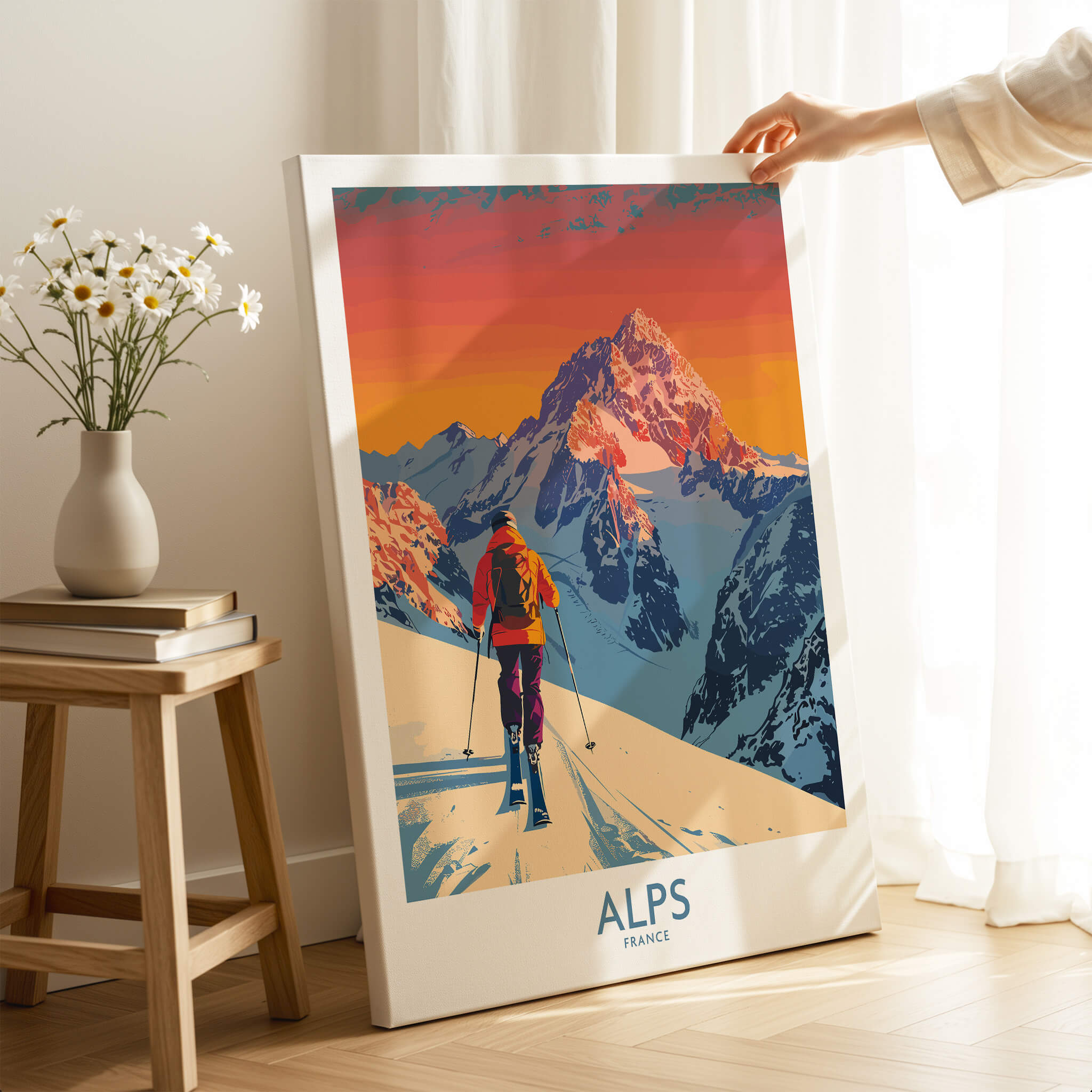 Alps Poster France featuring a skier on a snowy mountain with vibrant sunset colors in a cozy room.