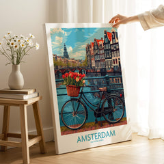 Amsterdam Poster featuring a bicycle with tulips on a bridge over canals, capturing Dutch life.