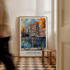 Bright Amsterdam Canal Poster - Colourful Dutch Houses Reflecting on Water Art displayed in a stylish room with bicycle.