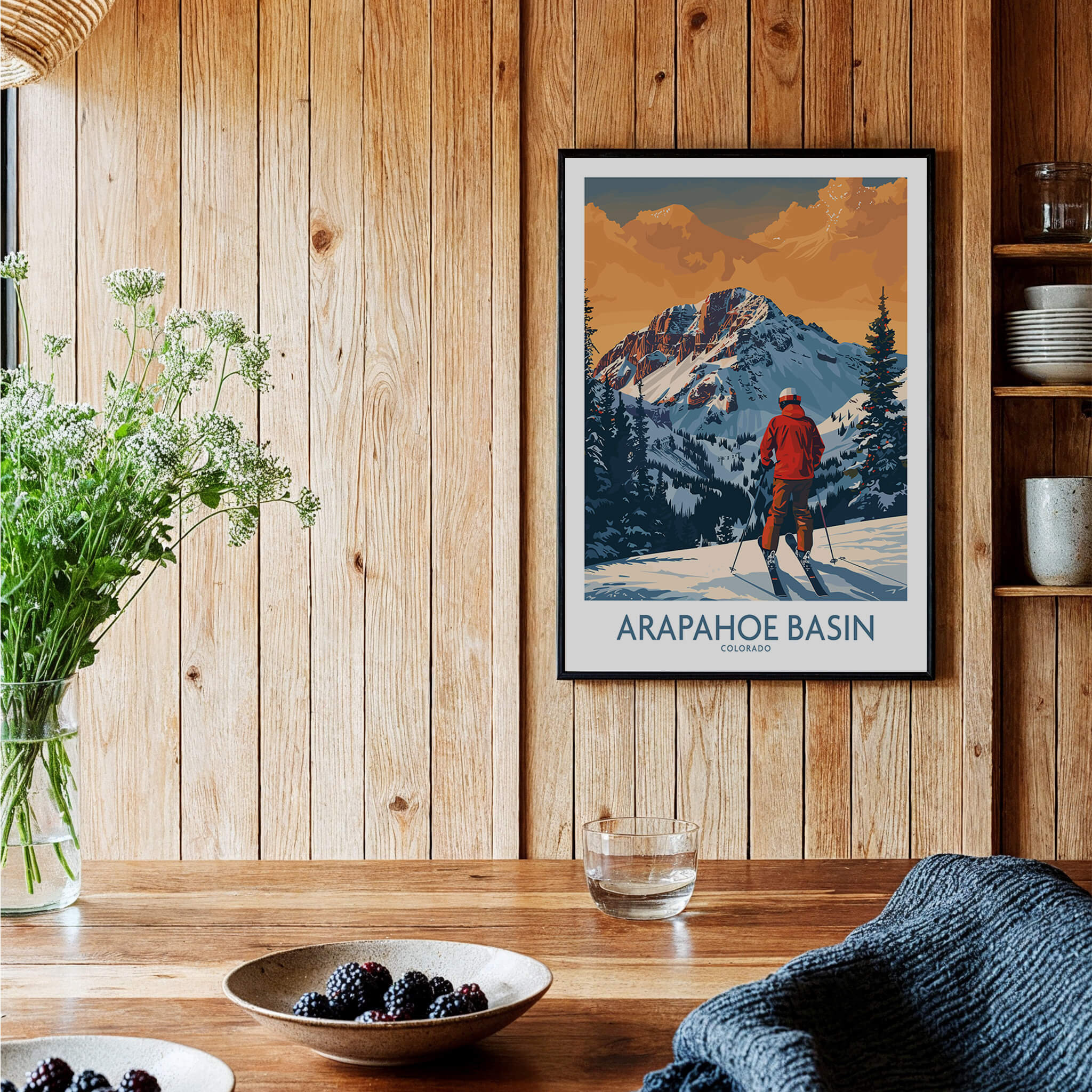 Arapahoe Basin Ski Print - Colorado showcasing a skier in front of majestic mountains with a wooden interior.