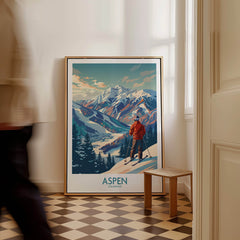 Aspen Wall Art featuring a ski poster design with mountains and trees in a cozy interior setting.