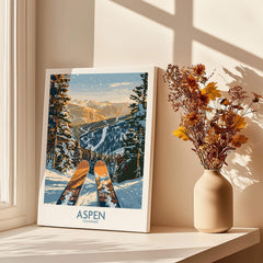 Aspen Wall Art Poster Colorado Ski Print featuring a stunning snow-covered mountain view with ski equipment.
