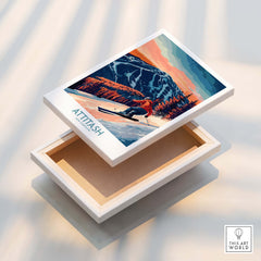 Attitash Ski Wall Art Print displayed on a wooden box, showcasing vibrant mountain and skiing design.