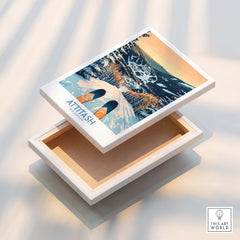 Attitash Ski Art Print displayed on an open box, showcasing winter landscape and skiing adventure.