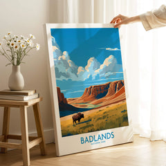 Badlands National Park travel poster canvas print with bison, held in cozy room setting