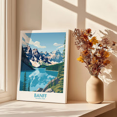 Banff National Park travel poster print on windowsill, vase with dried flowers, natural light