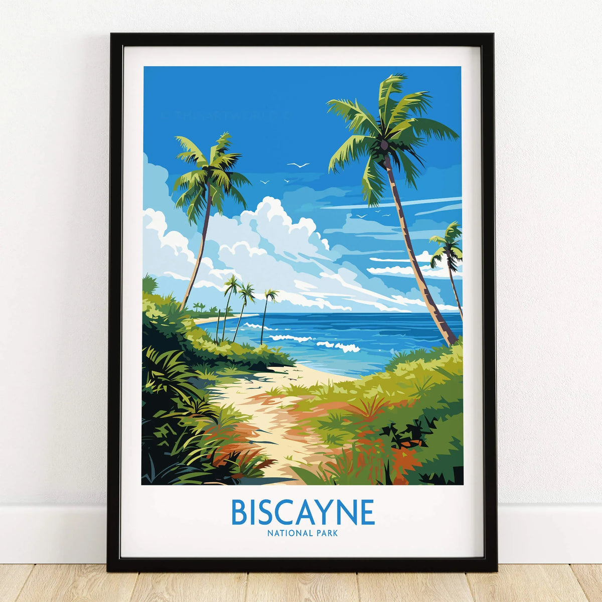 Biscayne National Park art print with palm trees, beach, and ocean in a black frame on floor