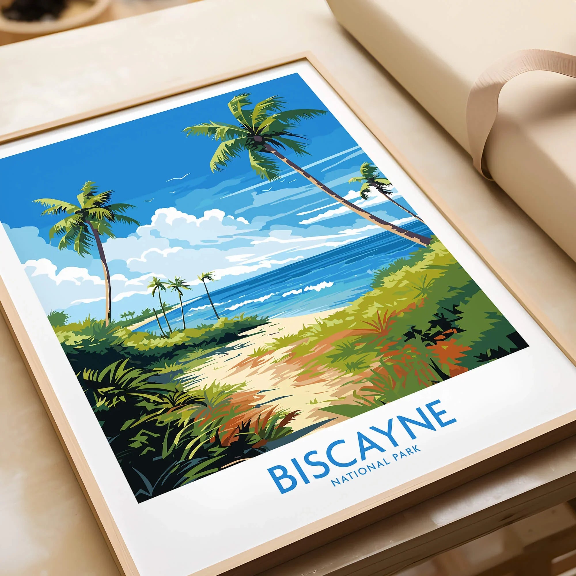 Framed Biscayne National Park art print with palm trees, ocean, and blue sky, unwrapped as a gift.