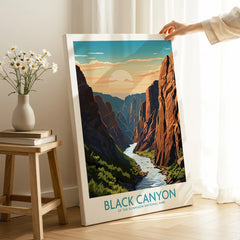 Black Canyon National Park canvas wall art with sunset landscape, hand holding print in modern home setting.