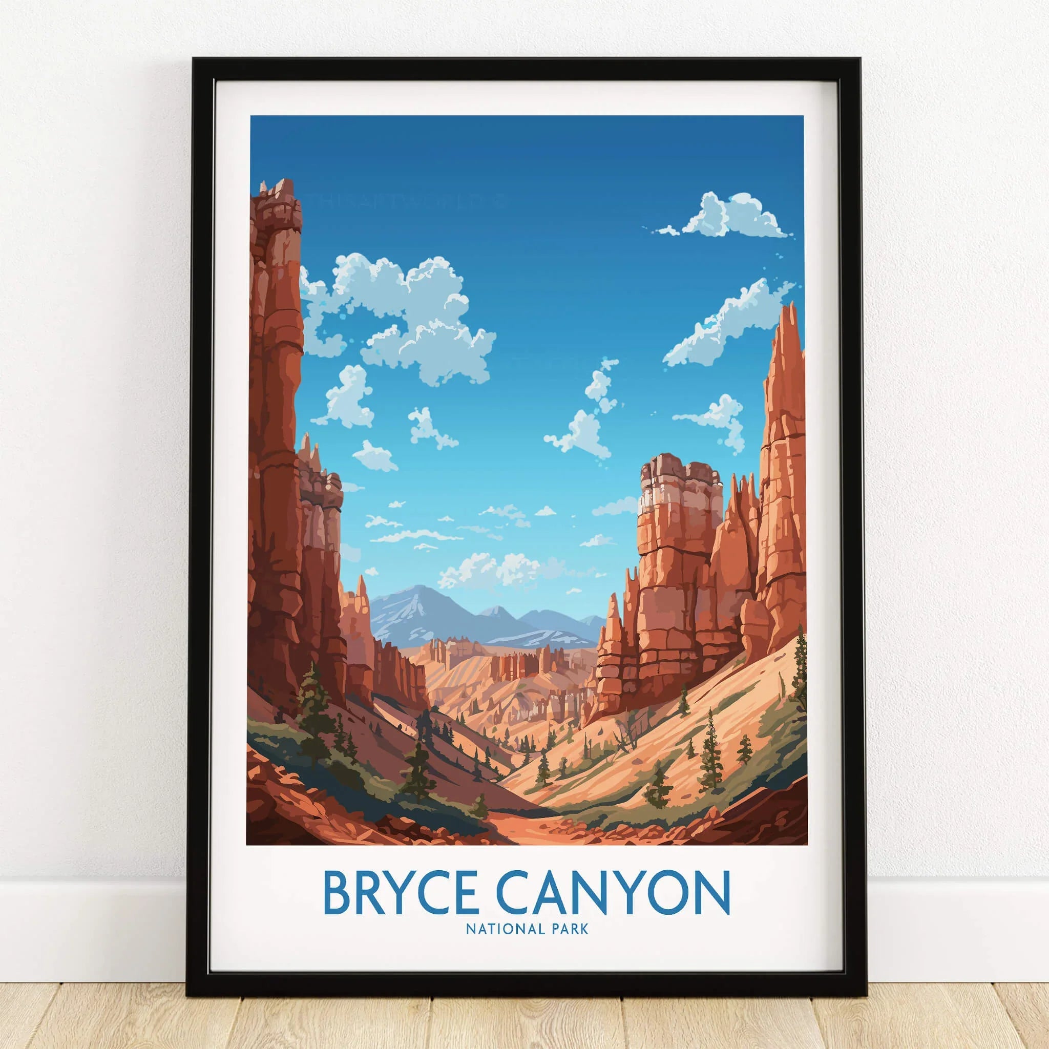 Bryce Canyon National Park art print in black frame on wooden floor, showcasing red rock spires.
