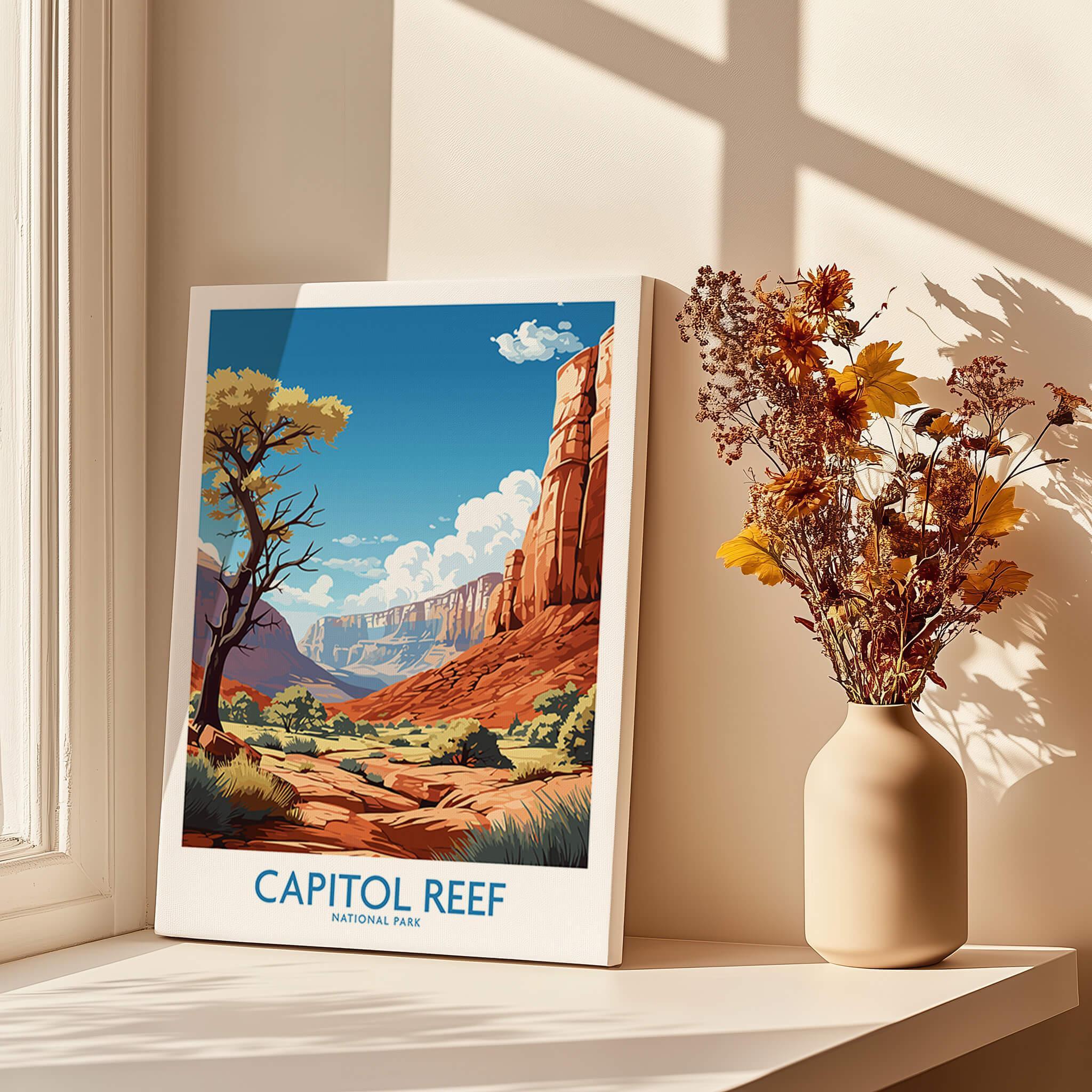 Capitol Reef National Park art print on canvas beside vase with dried flowers in sunlit window.