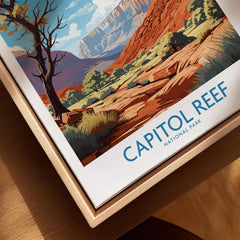 Capitol Reef National Park travel poster print in natural wood floating frame, close-up view.