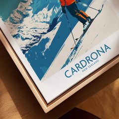Cardrona Ski Print - New Zealand showcasing a skier against stunning snowy mountains in a modern frame.