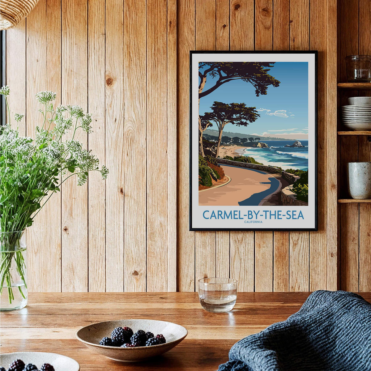 Carmel-by-the-Sea Wall Art Print showcasing a serene beach scenery in a stylish home setting with wooden decor.