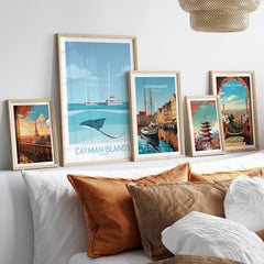 Cayman Islands Wall Art - Stingray City Poster displayed among travel posters in a stylish home decor setting.