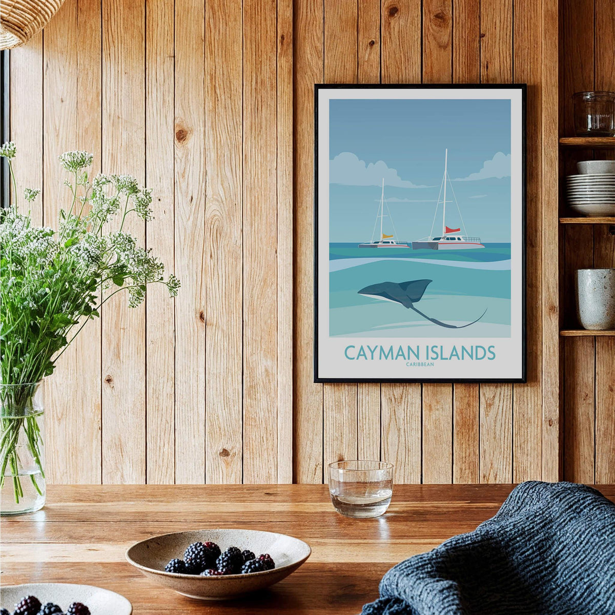 Cayman Islands Wall Art - Stingray City Poster showcased in a cozy interior with wooden decor and a dining table.