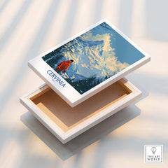 Cervinia Travel Poster - Italy displayed on a wooden box, showcasing the beauty of Cervinia ski resort.
