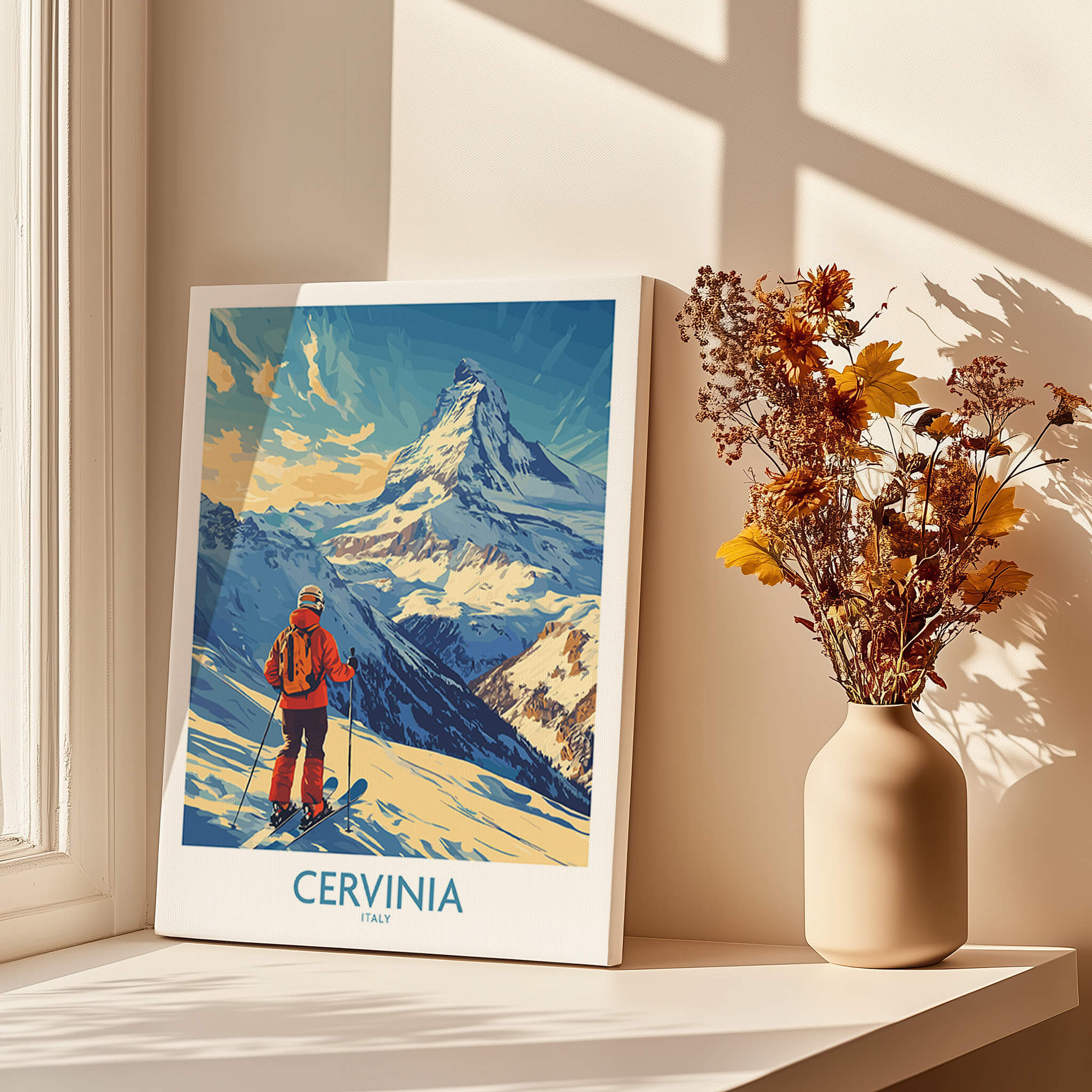 Ski Poster Cervinia Italy displayed near a vase with dried flowers, featuring mountain scenery and a skier.