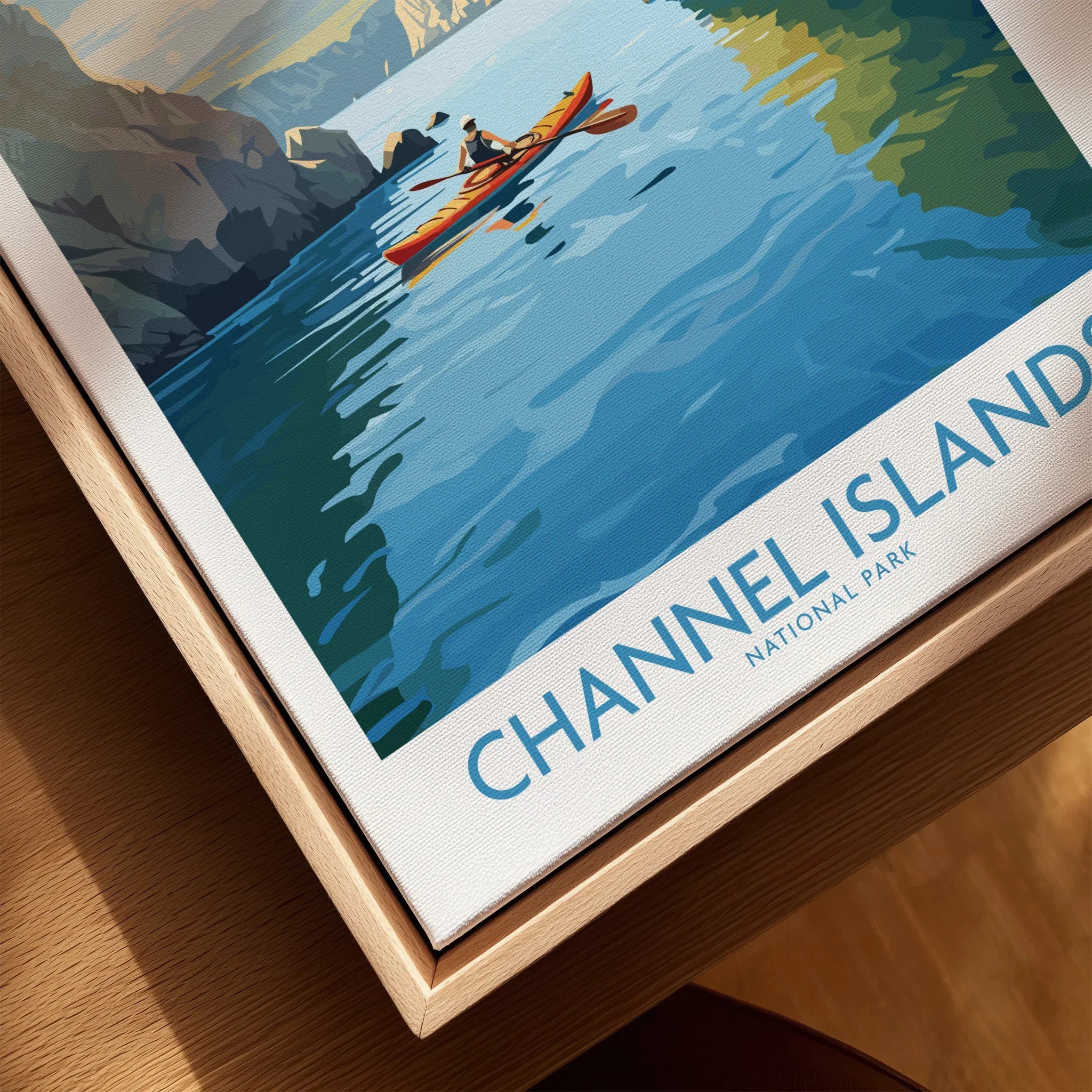 Framed Channel Islands National Park art print with kayak on blue water, natural wood edge