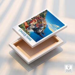 Cinque Terre Travel Print displayed on a decorative box, featuring colorful coastal views of Italy's Cinque Terre.