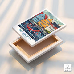 Denmark Copenhagen Poster - Red Bike, Colorful Canal Houses Art displayed on a wooden box.