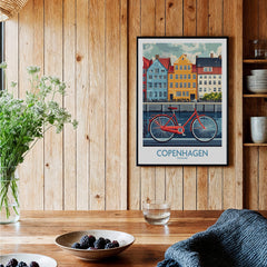 Denmark Copenhagen Poster - Red Bike, Colorful Canal Houses Art displayed in a wooden interior setting.