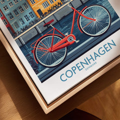 Denmark Copenhagen Poster - Red Bike, Colorful Canal Houses Art featuring a red bicycle and canal houses in Copenhagen.