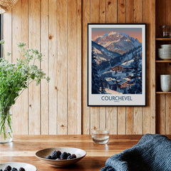 Courchevel Ski Print - France displayed in a cozy interior with wooden decor and a mountain backdrop.