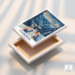 Courchevel Poster France displayed on a decorative box showcasing winter ski vibes and stunning mountain scenery.