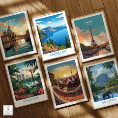 Set of six framed travel posters featuring Venice, Paris, Barcelona, Crater Lake, Singapore, and Sri Lanka on a wooden floor.