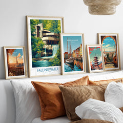 Framed travel posters of Paris, Fallingwater, Copenhagen, Tokyo, and Barcelona for wall art decor
