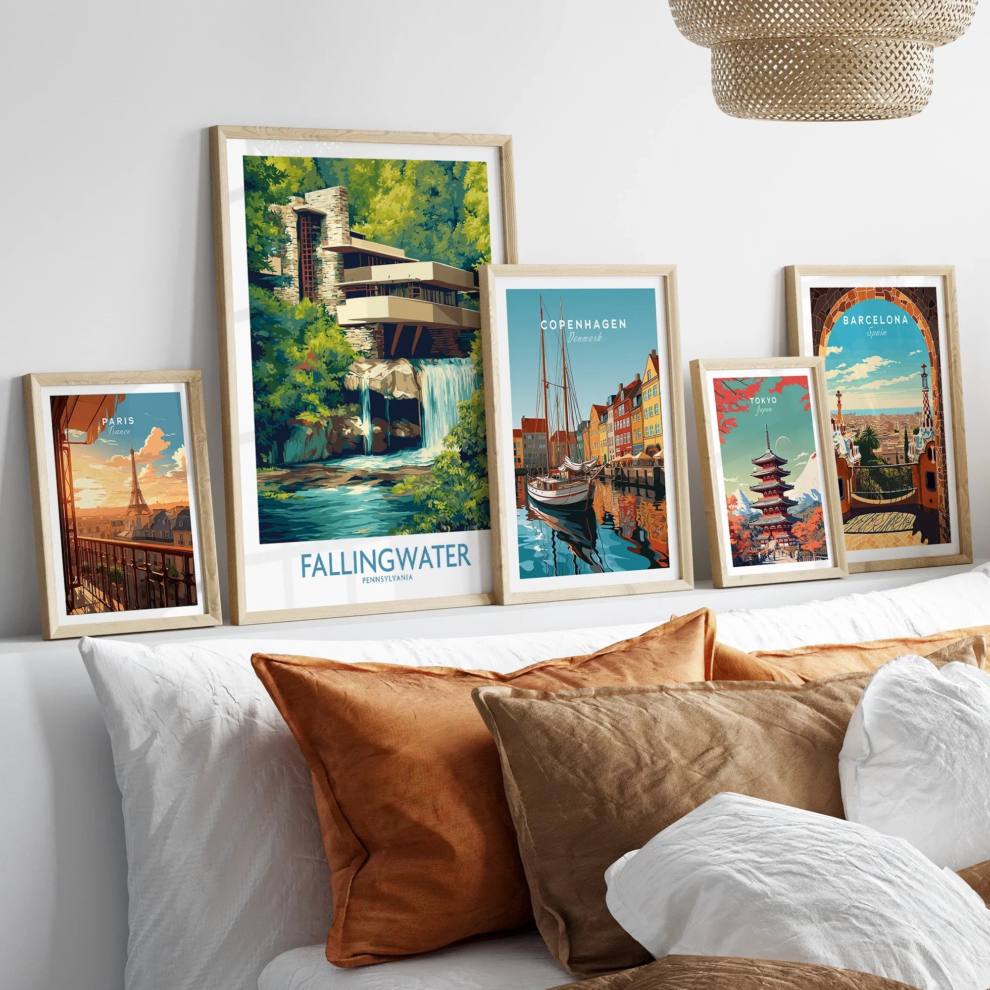 Framed travel posters of Paris, Fallingwater, Copenhagen, Tokyo, and Barcelona for wall art decor