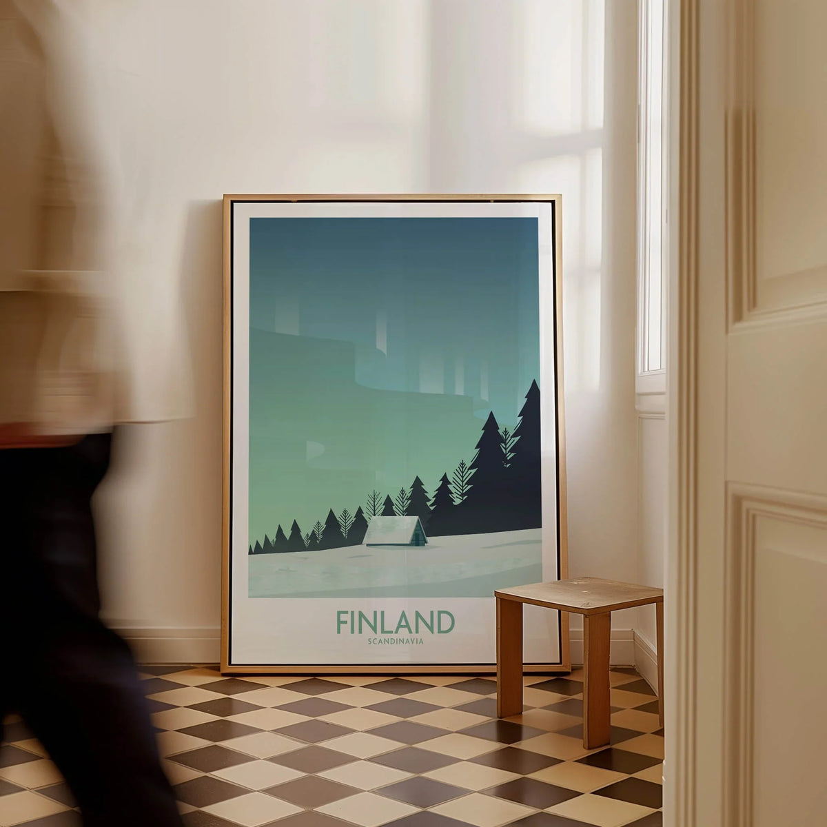 Finland Print Travel Poster framed in a modern interior, showcasing Nordic landscapes and northern lights.