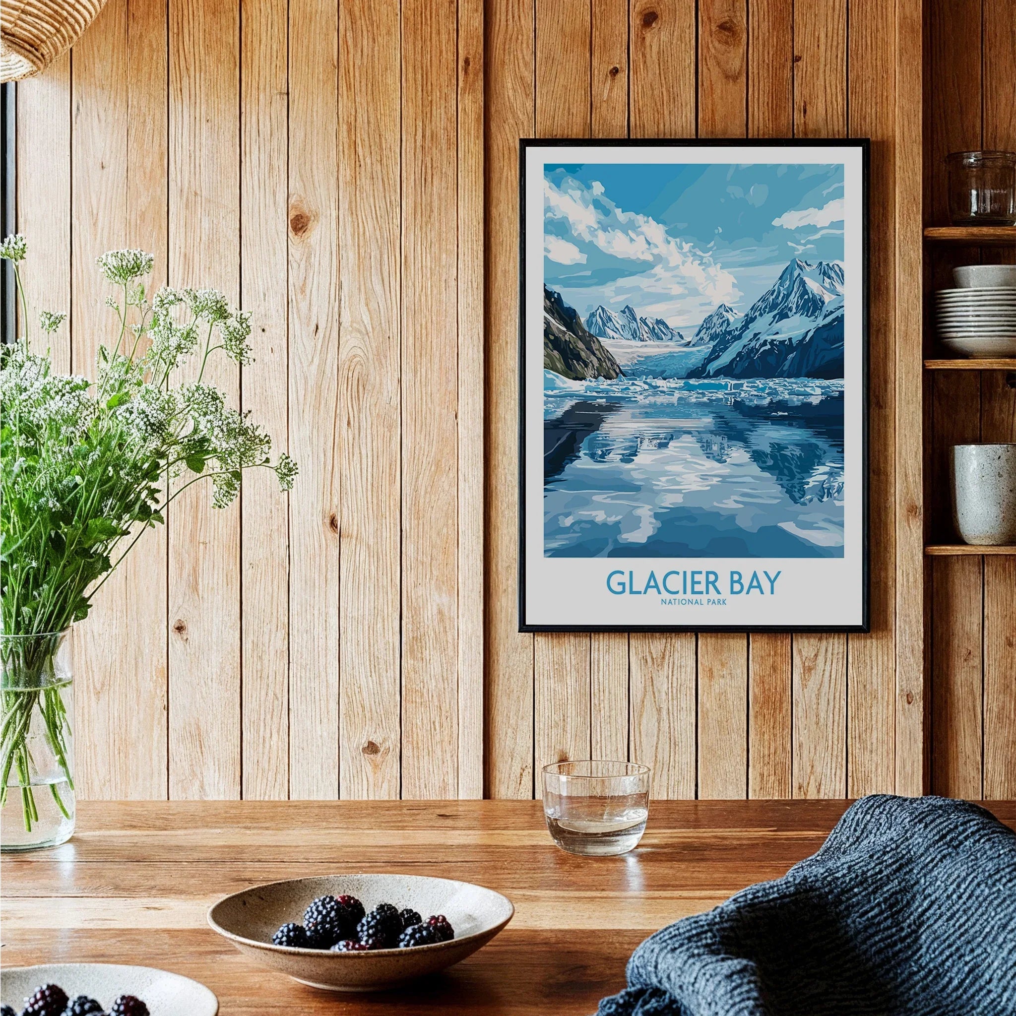 Glacier Bay National Park art print in black frame on wood wall in cozy kitchen setting
