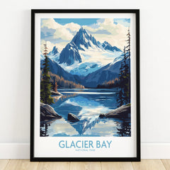 Glacier Bay National Park art print in black frame on wooden floor, featuring mountain and lake landscape.