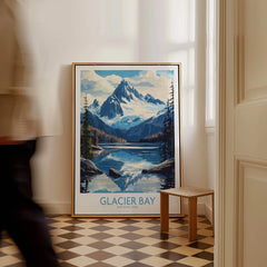 Framed Glacier Bay National Park travel poster on floor in bright modern room, man walking past.