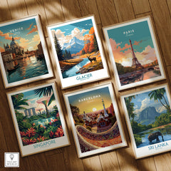 Set of six framed travel posters featuring Venice, Glacier National Park, Paris, Singapore, Barcelona, and Sri Lanka, arranged on a wooden floor.