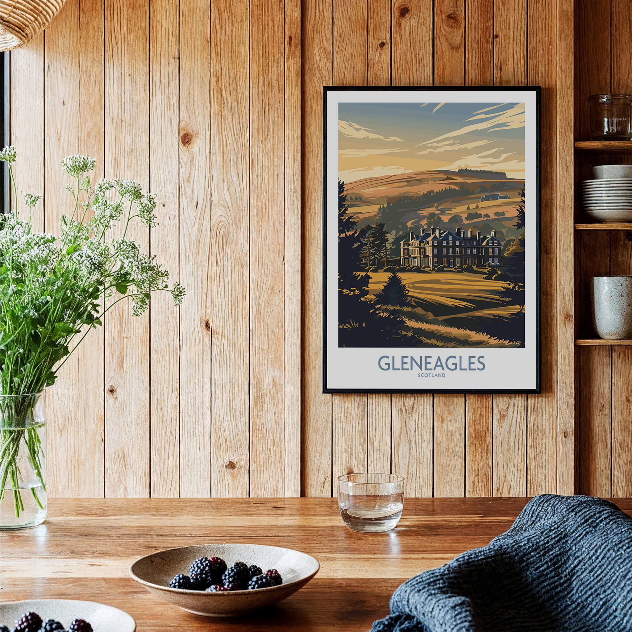 Gleneagles Scotland Golf Poster framed on wooden wall, showcasing beautiful Scottish countryside and iconic golf course.