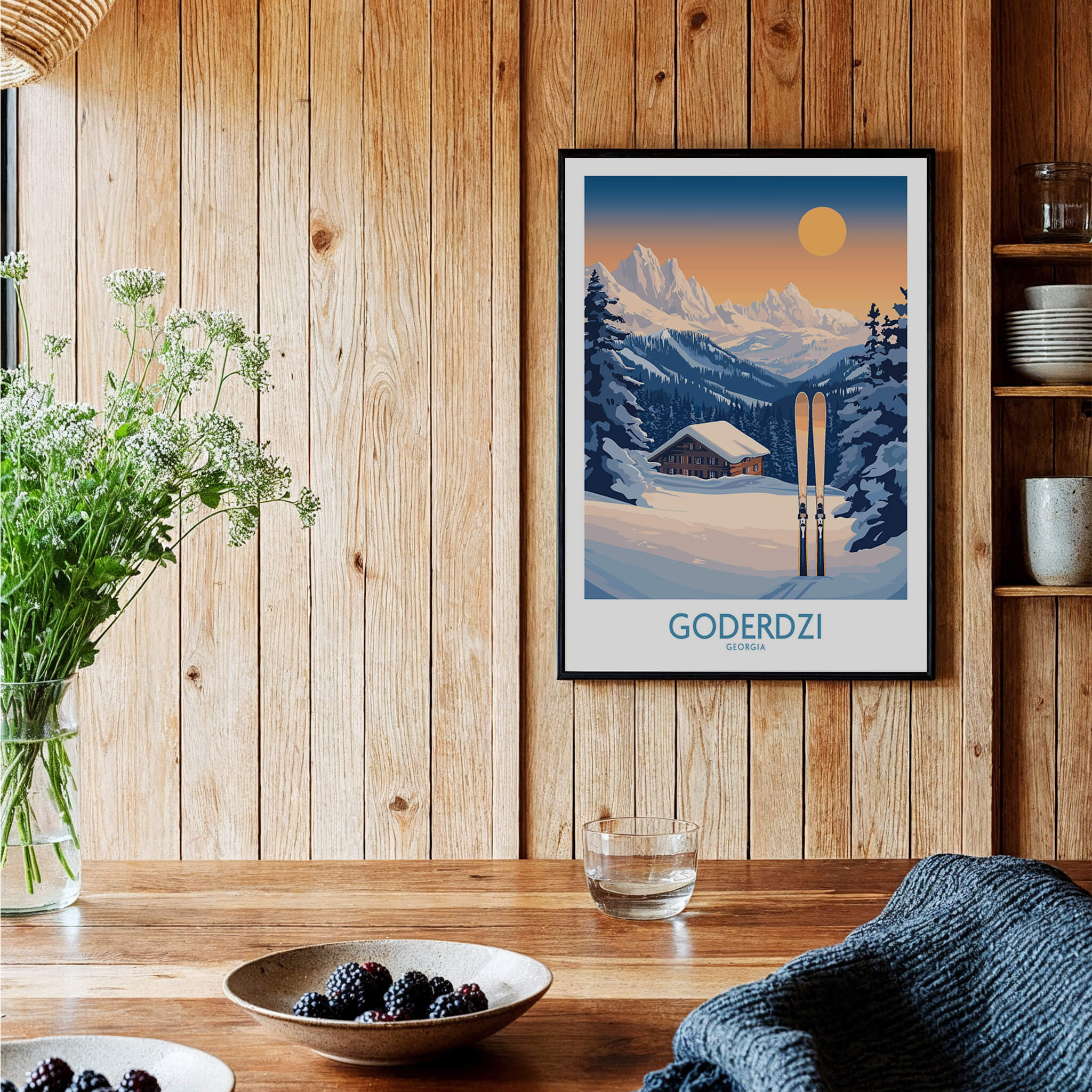 Ski Poster Goderdzi Georgia showcasing serene mountain landscape and skiing equipment in cozy home setting.