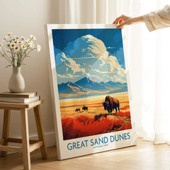 Great Sand Dunes National Park print with bison and mountains, held in bright home setting.