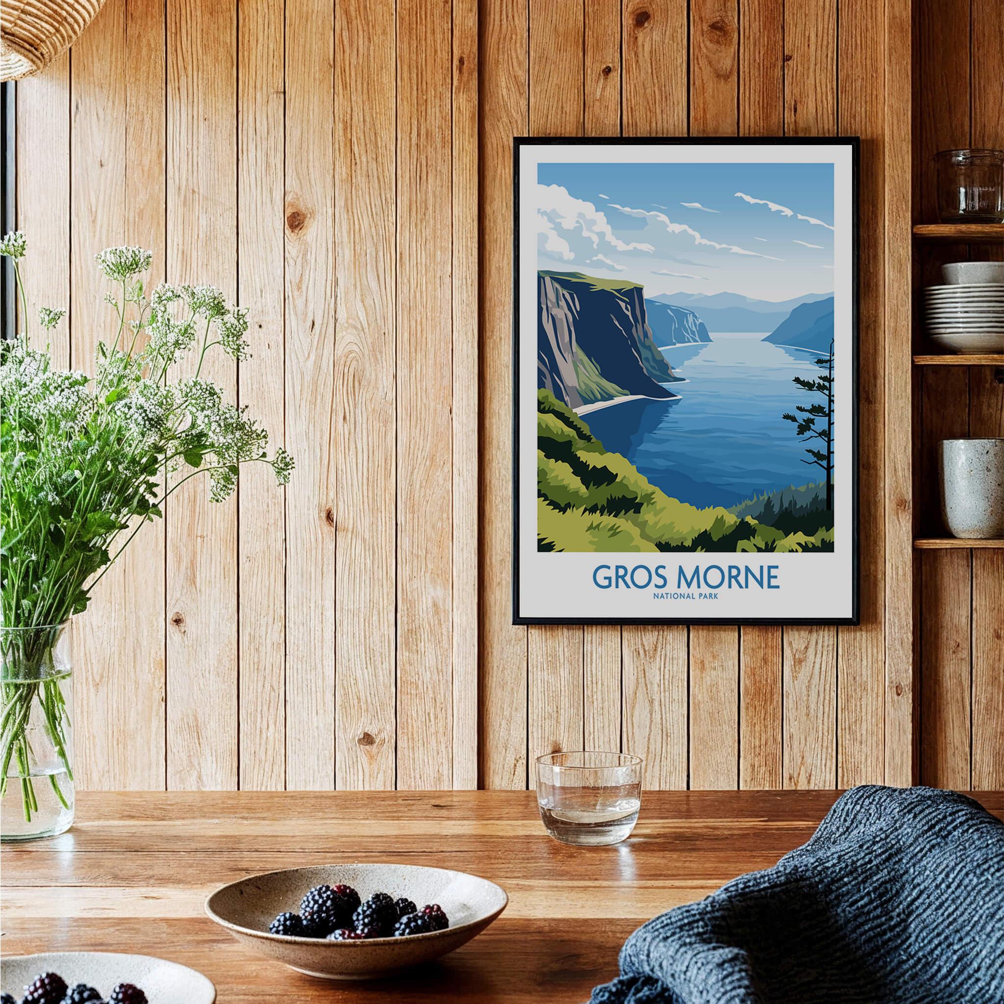 Framed Gros Morne National Park art print on wood wall in cozy kitchen setting