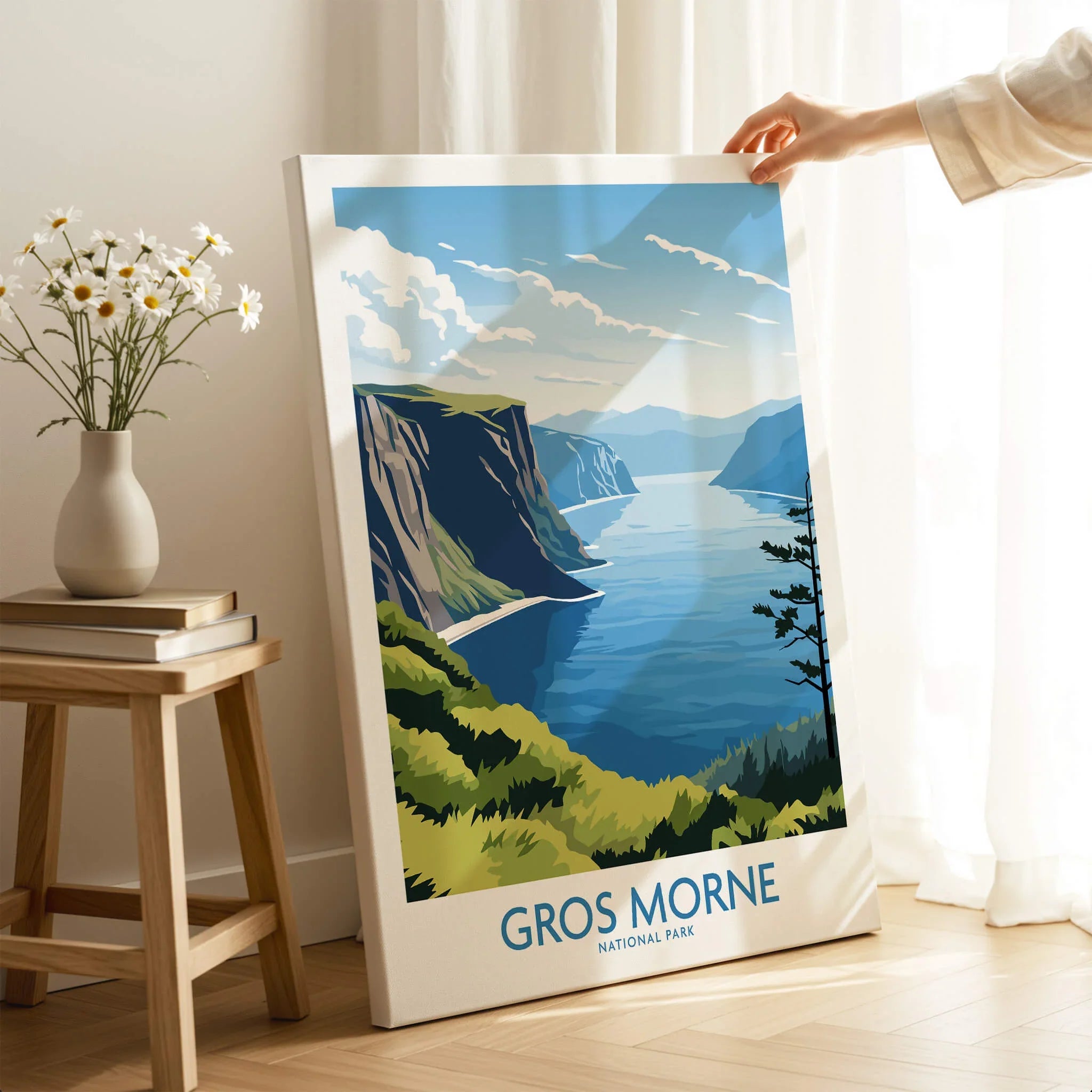 Hand holding Gros Morne National Park canvas print, landscape wall art in cozy room