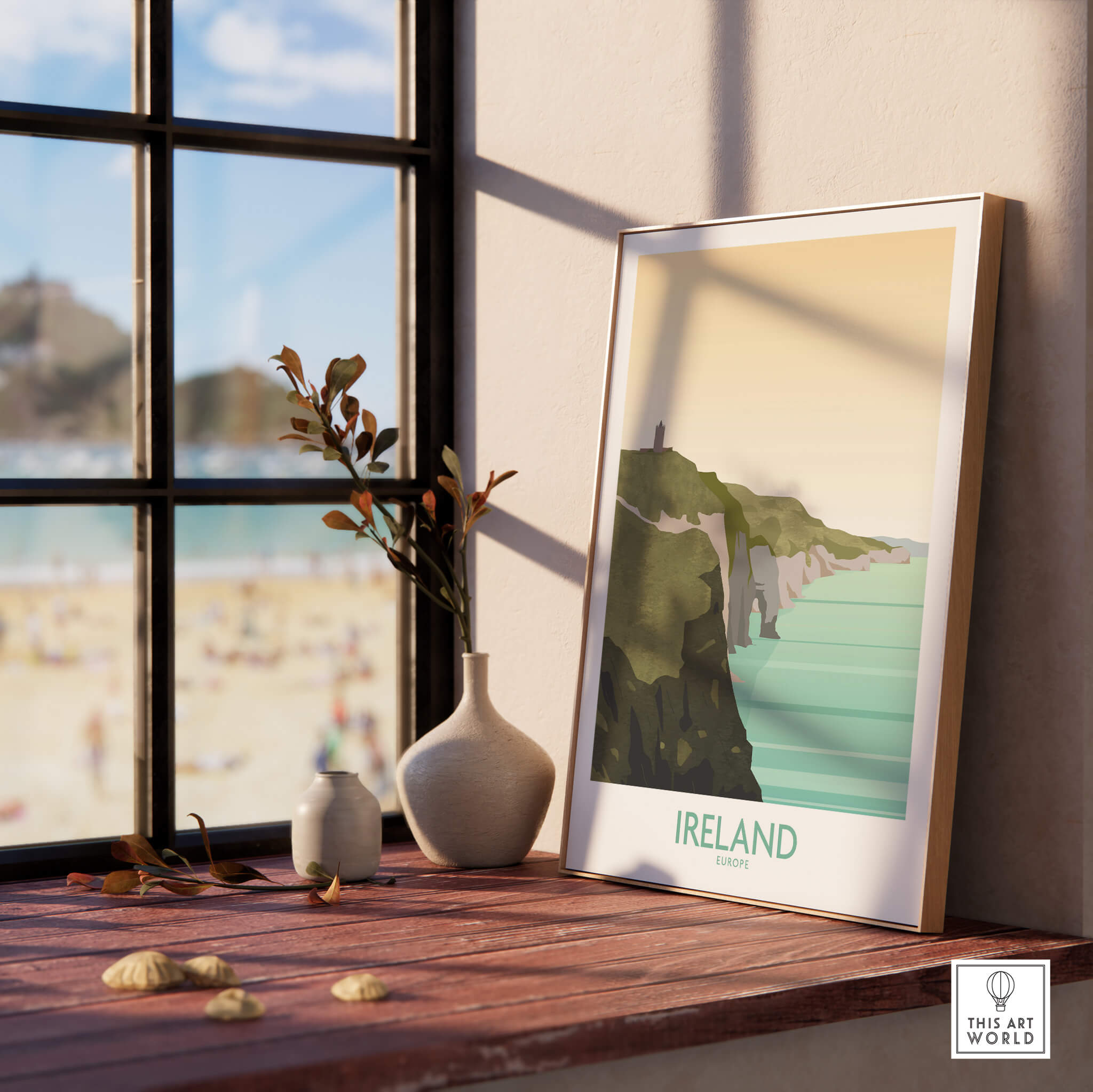 Ireland Print Travel Poster on a windowsill showcasing Cliffs of Moher and a beach view, perfect for wall art.