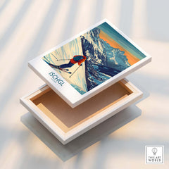 Ski Poster Ischgl Austria displayed on a wooden box, showcasing vibrant ski imagery and scenic mountain views.