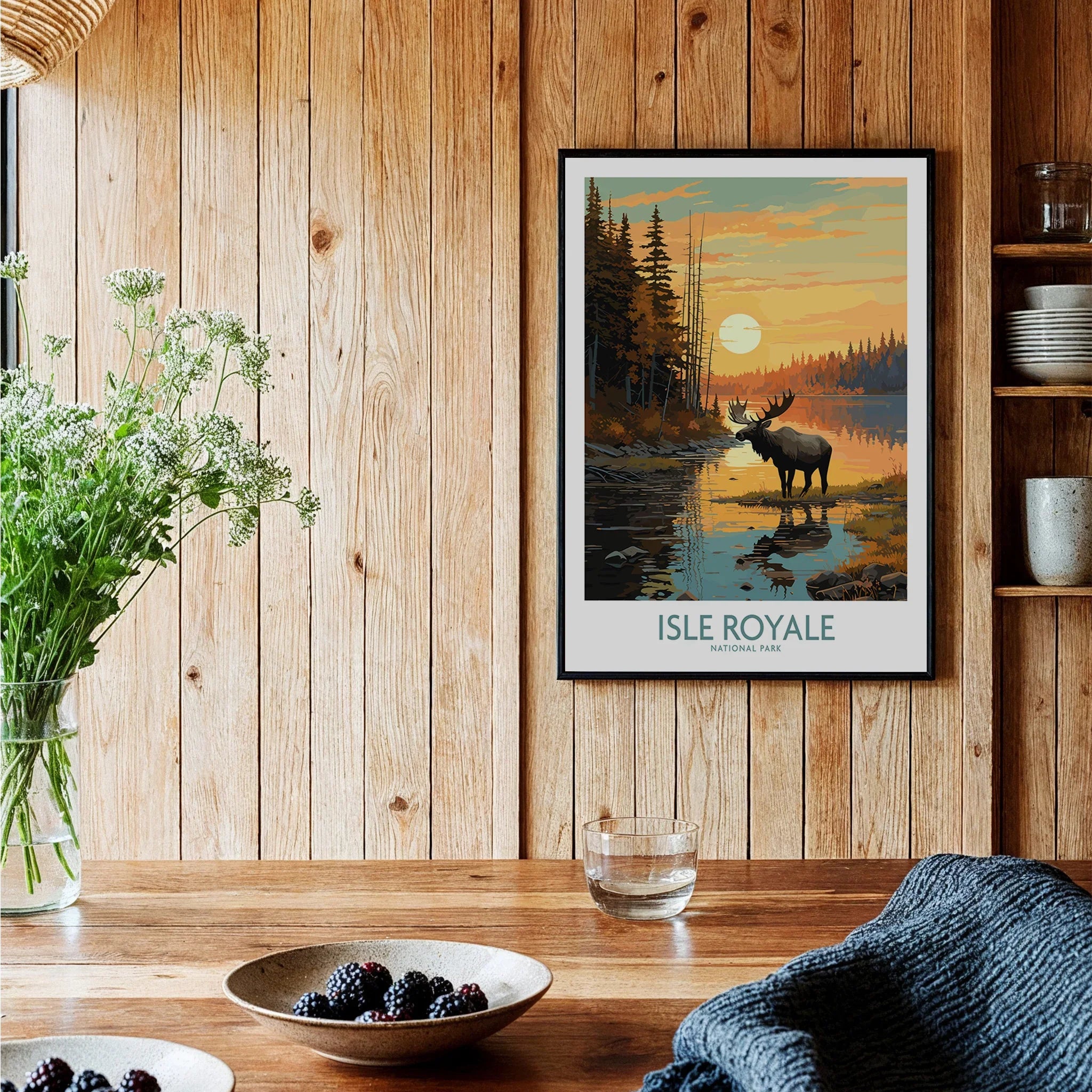 Isle Royale National Park moose art print in black frame displayed in rustic kitchen setting