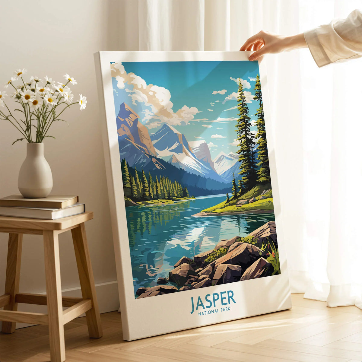 Hand holding Jasper National Park travel poster canvas with mountain and lake art, room decor