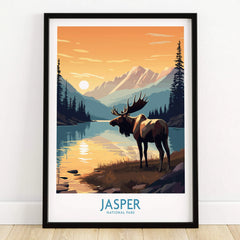 Jasper National Park art print with moose by a lake at sunset, in black frame on wooden floor